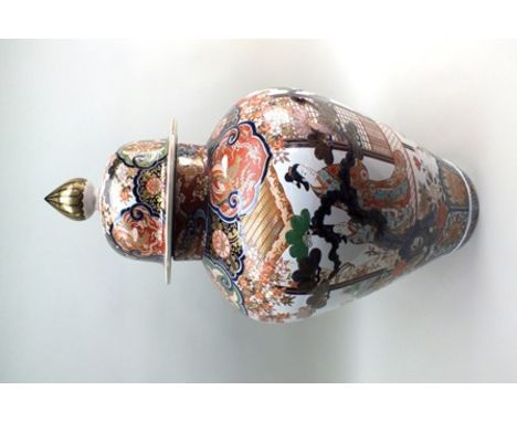 A large 20th century Japanese baluster vase and cover, painted in the Imari palette with panels of Bijin in gardens, the dome