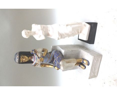 An "Edoardo Tasca of Italy" limited edition ceramic figure of an Egyptian Queen, no. 674/2000, enamelled and gilded, seated u