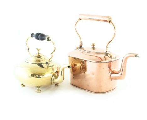 A 19th century oval straight side copper kettle with rigid handle, an Arts & Crafts copper and brass oil lamp in the manner o