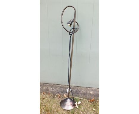 A bronzed effect adjustable reading light 