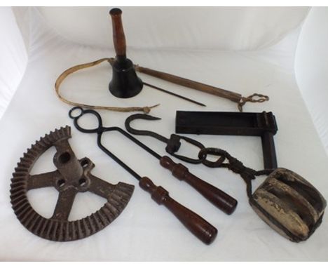 A metal and stained wood bird scarer, a hand bell, block and tackle, whip etc. 