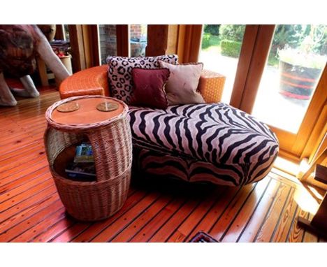 A late 20th century Italian 'Pierantonio Bonacina' amorphous shaped sofa/chair, with leather weave made back, zebra print wea