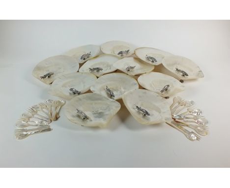 A set of twelve silver mounted mother of pearl shell oyster/hors d’oeuvres dishes, Sheffield 1997 & 1998, each designed as a 
