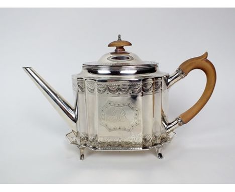 A George III silver teapot and stand, Robert Hennell I, London 1790, the teapot of shaped hexagonal form with fluted corners 