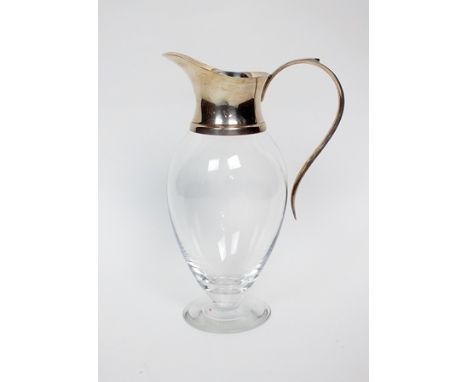 A silver mounted glass claret jug, Mappin & Webb, Sheffield 2000, the glass of baluster form with silver collar, spout and sc