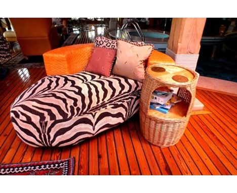 A late 20th century Italian 'Pierantonio Bonacina' amorphous shaped sofa/chair, with leather weave made back, zebra print wea