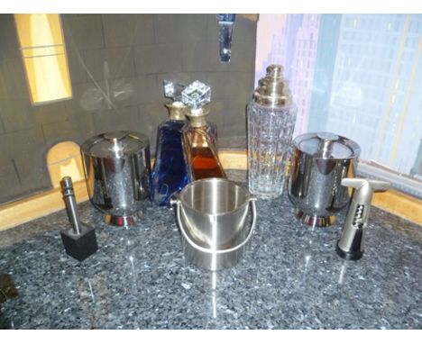 A collection of novelty cocktail shakers, includes one in the form of a lighthouse 36cm high, one in the form of a ship's lan