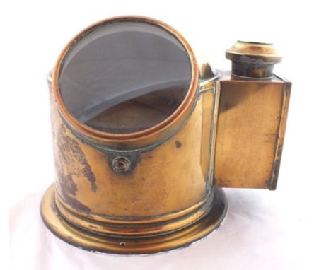 A brass binnacle cased ship's compass, circa 1900, the domed cover with ring carrying handle, side mounted oil lamp complete 