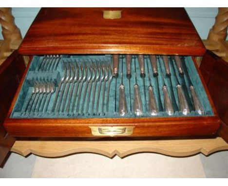 A comprehensive cased canteen of Old English and rat tail pattern silver cutlery, S & Co Ltd, London 1935, comprising; twelve