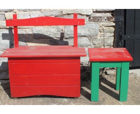 A red painted wood box base bench and a painted wood table (red and green), 91cm wide 