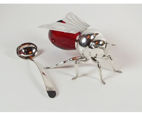 A Mappin & Webb silver plated and ruby glass novelty honey pot, designed as a silver plated bee, with hinged ‘wings’ cover ab