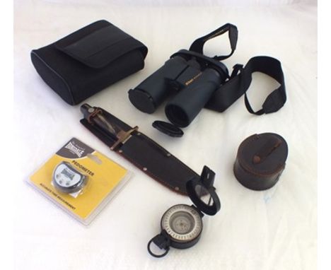 A pair of "Nikon" Monarch binoculars, 10 x 42, waterproof, cased, a venture sheath knife in a leather scabbard, a "Lonsdale" 