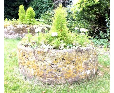 A 19th century carved stone demi-lune garden trough, 82cm wide 
