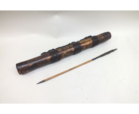 A bamboo quiver with straw work banding, 59cm long, contains one arrow 