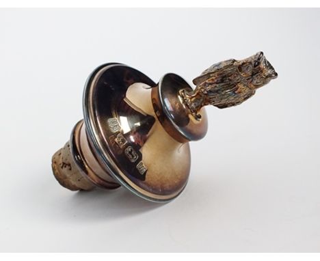 A silver mounted cork stopper, Barker Ellis Silver Company, Birmingham 1996, with cast owl finial, 8.5cm high 