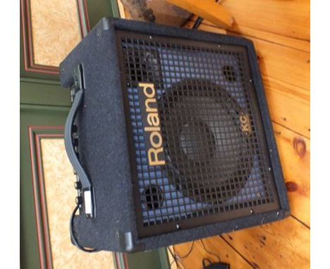 A "Roland" KC-60 mixing keyboard amplifier 