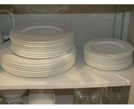 A quantity of John Lewis bone china, plain white dinner wares, including plates, side plates, bowls etc together with a large