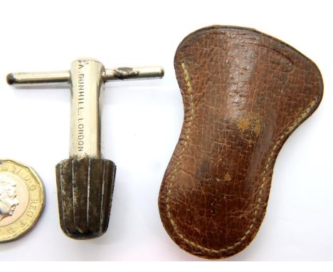 Alfred Dunhill pipe tamper in leather case. P&amp;P Group 1 (£14+VAT for the first lot and £1+VAT for subsequent lots) 
