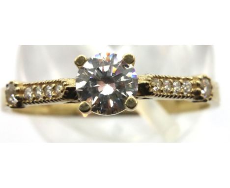 9ct gold ring with stone set shoulders, size P, 1.5g. P&amp;P Group 1 (£14+VAT for the first lot and £1+VAT for subsequent lo