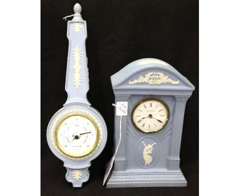 A Wedgwood mantle clock and a Wedgwood wall barometer. Not available for in-house P&amp;P, contact Paul O'Hea at Mailboxes on