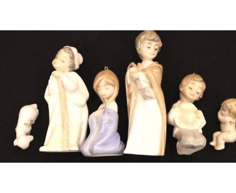 Two boxed Lladro sets of three Christmas ornaments. P&amp;P Group 2 (£18+VAT for the first lot and £3+VAT for subsequent lots