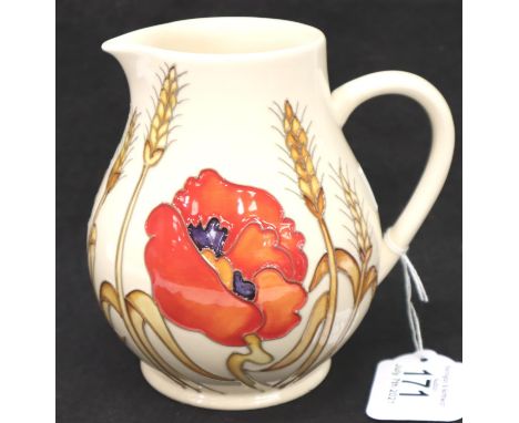 Moorcroft jug in the Harvest Poppy pattern, H: 14 cm. P&P Group 2 (£18+VAT for the first lot and £3+VAT for subsequent lots)C