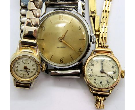 A gents Timex wristwatch and two vintage ladies wristwatches. P&amp;P Group 1 (£14+VAT for the first lot and £1+VAT for subse