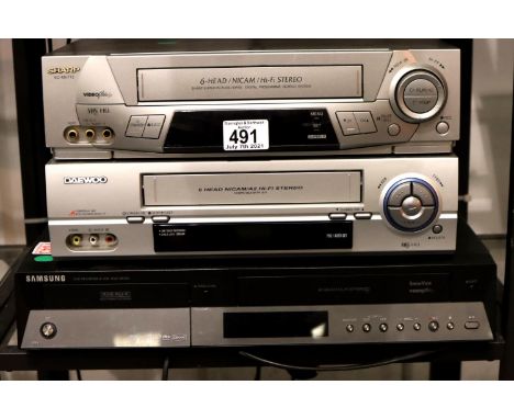 Sharp 8 head Nicam video recorder, a Daewoo eight head Nicam video recorder and a Samsung DVD  and VCR player (no remotes). N