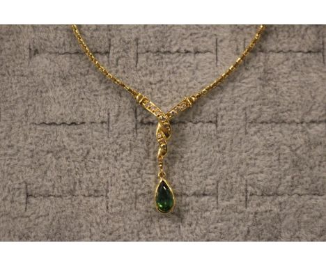 18ct Gold Peridot &amp; Diamond Set Pendant on chain 6.9g total weight 