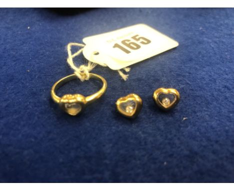 A Chopard happy diamond 18ct gold ring and earrings (missing butterflies) 