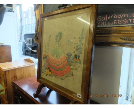A tapestry fire screen