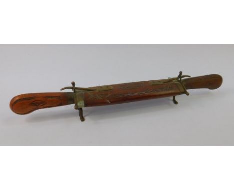 An Indian knife and fork set, within combined brass mounted table sheath, 44.5cm long.