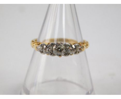 A diamond five stone ring, set in yellow metal, approx 0.45cts, size K, 2.9g.