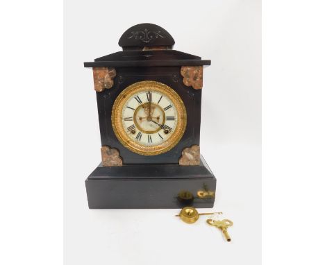 An Ansonia Clock Company late 19thC slate and marble mantel clock, brass and enamel dial bearing Roman numerals, visible broc