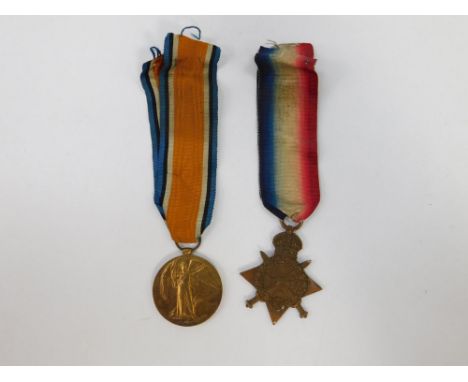 A WWI 1914-15 Star and Victory Medal, (lacking appropriate ribbon), inscribed to 18-1104 Pte H Spalding, Durham Light Infantr