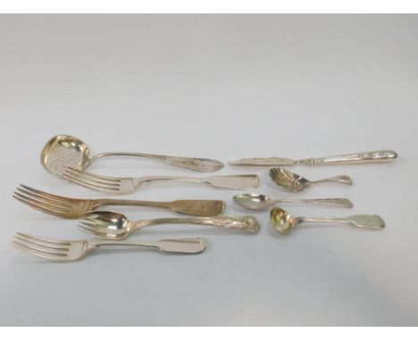Two William IV silver table forks, one crest engraved, London 1831, Victorian silver caddy spoon, London 1851, butter knife, 