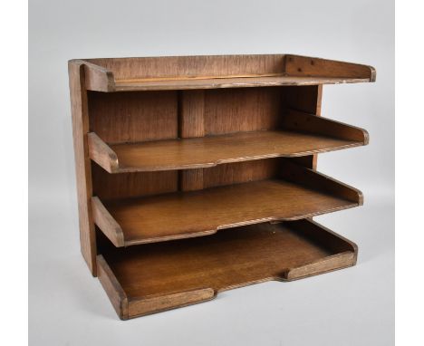 An Edwardian Desktop Four Shelf Stationery Rack, 41cms Wide and 33cms High 