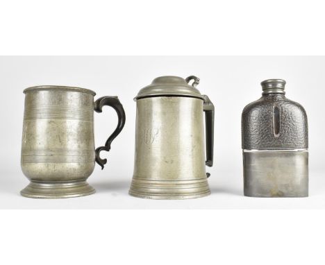 A 19th Century Pewter Tankard with Hinged Lid together with a Pewter Tankard Monogrammed MI and a Hip Flask 