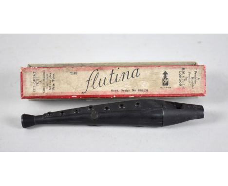 A 1940s Bakelite Musical Flutina, Reg No.838033 with Original Cardboard Box and Instruction Leaflet 