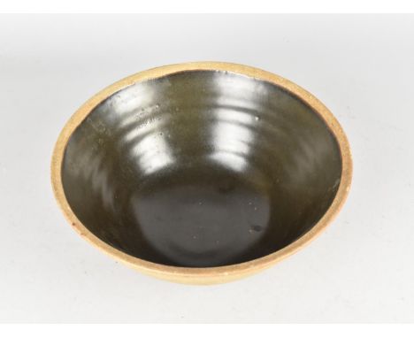 A Studio Pottery Bowl, Brown Oxide Variegated Glaze, Leach Studio Pottery Mark, 25cm Diameter 