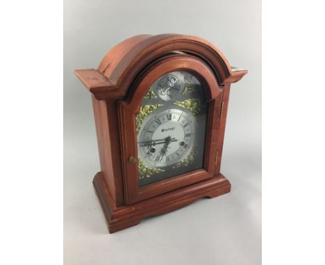 VINTAGE STAINED WOOD MANTEL CLOCK, 36cm high, along with a carved wood dressing mirror (2)