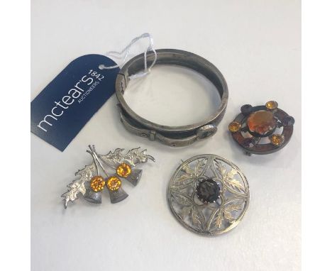 LOT OF SILVER AND WHITE METAL JEWELLERY, including a buckle bangle, Scottish brooches and rings