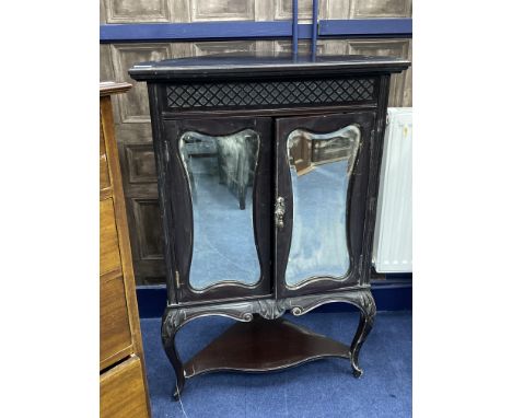 EARLY 20TH CENTURY STAINED WOOD CORNER CABINET, the two hinged doors with mirror fronts, 67cm wide