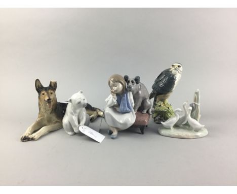 LLADRO FIGURE OF A GIRL SEATED WITH A DOG, 15cm high, along with a Nao group of Geese, 12cm high, Lladro model of a polar bea