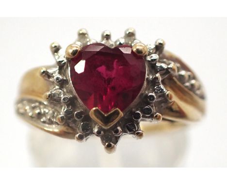 9ct gold ring set with a heart shaped central ruby and diamond shoulders, size M, 2.5g. P&amp;P Group 1 (£14+VAT for the firs
