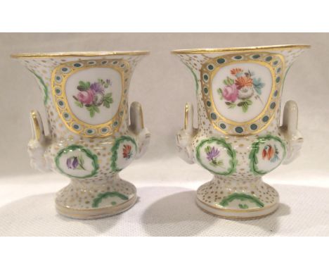 Pair of miniature Continental ceramic urns, each H: 70 mm. P&amp;P Group 1 (£14+VAT for the first lot and £1+VAT for subseque