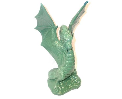 Green ceramic dragon, H: 42 cm, damage to the tip of one wing. P&amp;P Group 3 (£25+VAT for the first lot and £5+VAT for subs