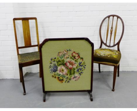 A mahogany framed and tapestry fire screen together with two mahogany side chairs (3) 