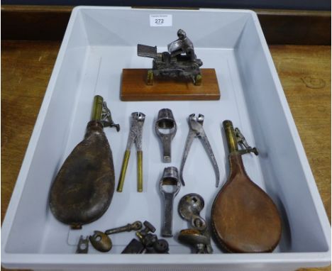 A mixed lot to include a flintlock mechanism, shot making tools and two powder flasks (a lot) 