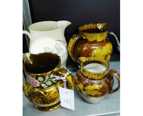A 19th century cream ware, 'Come Box the Compass' jug, together with two Sunderland Chinoiserie brown glazed vases, together 